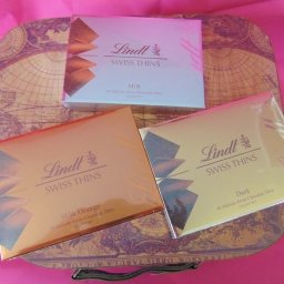 Lindt swiss milk, orange & dark 